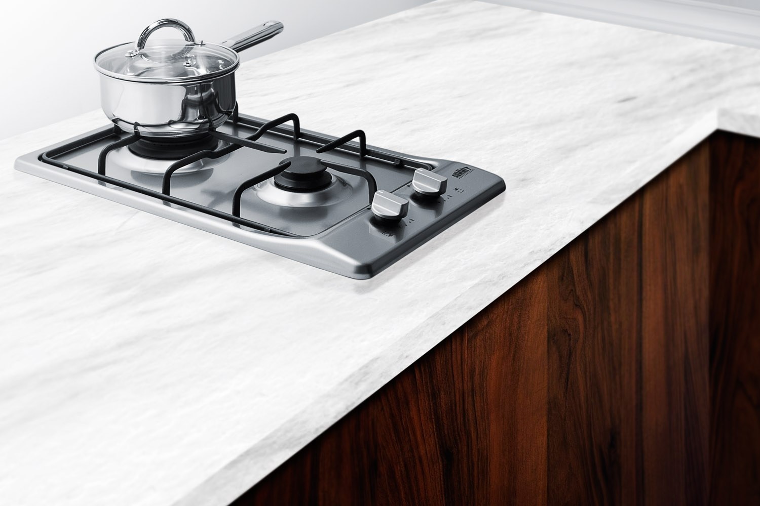 2-burner gas cooktop with sealed burners, stainless steel surface, and cast iron grates